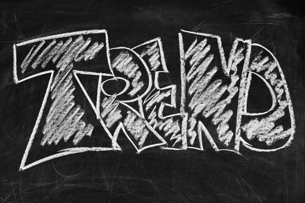 Word Trend writen on a board with a chalk